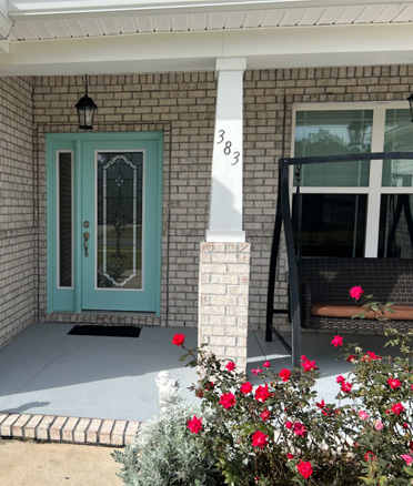 Exterior painting of main door after.